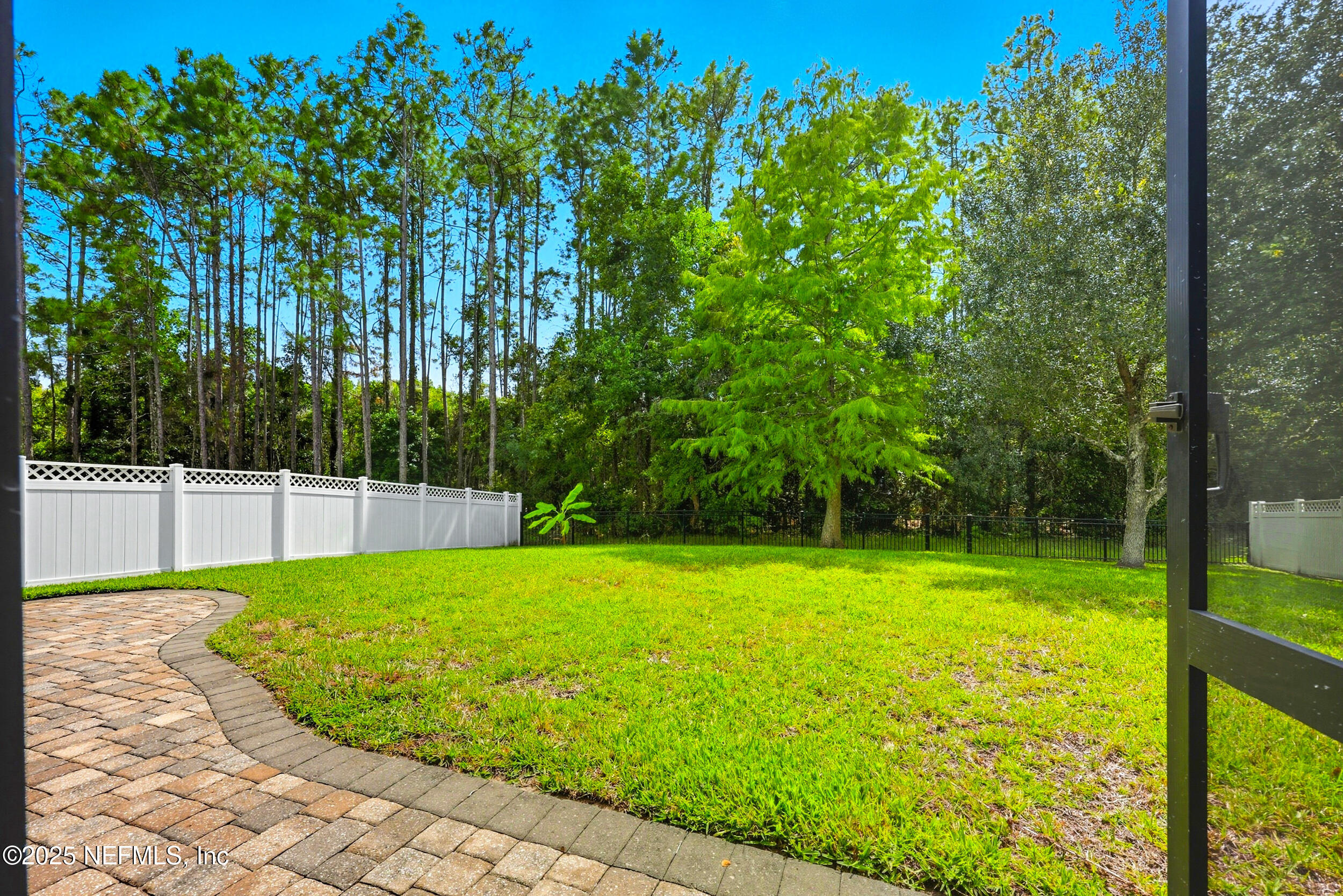 105 Castlegate Lane St. Johns, FL 32259 - Photo 42 of 45 a view of a swimming pool with a backyard