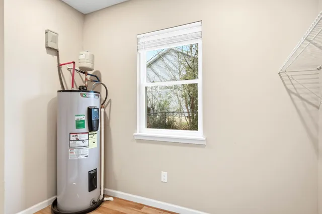 a view of an entryway with wooden floor