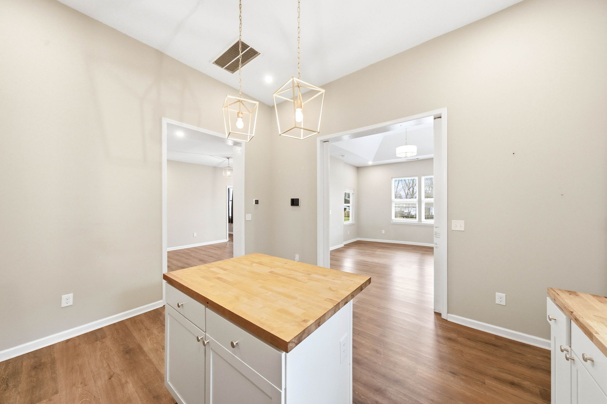 504 North Washington Street Tullahoma, TN 37388 - Photo 10 of 41 a kitchen with kitchen island a sink appliances and cabinets