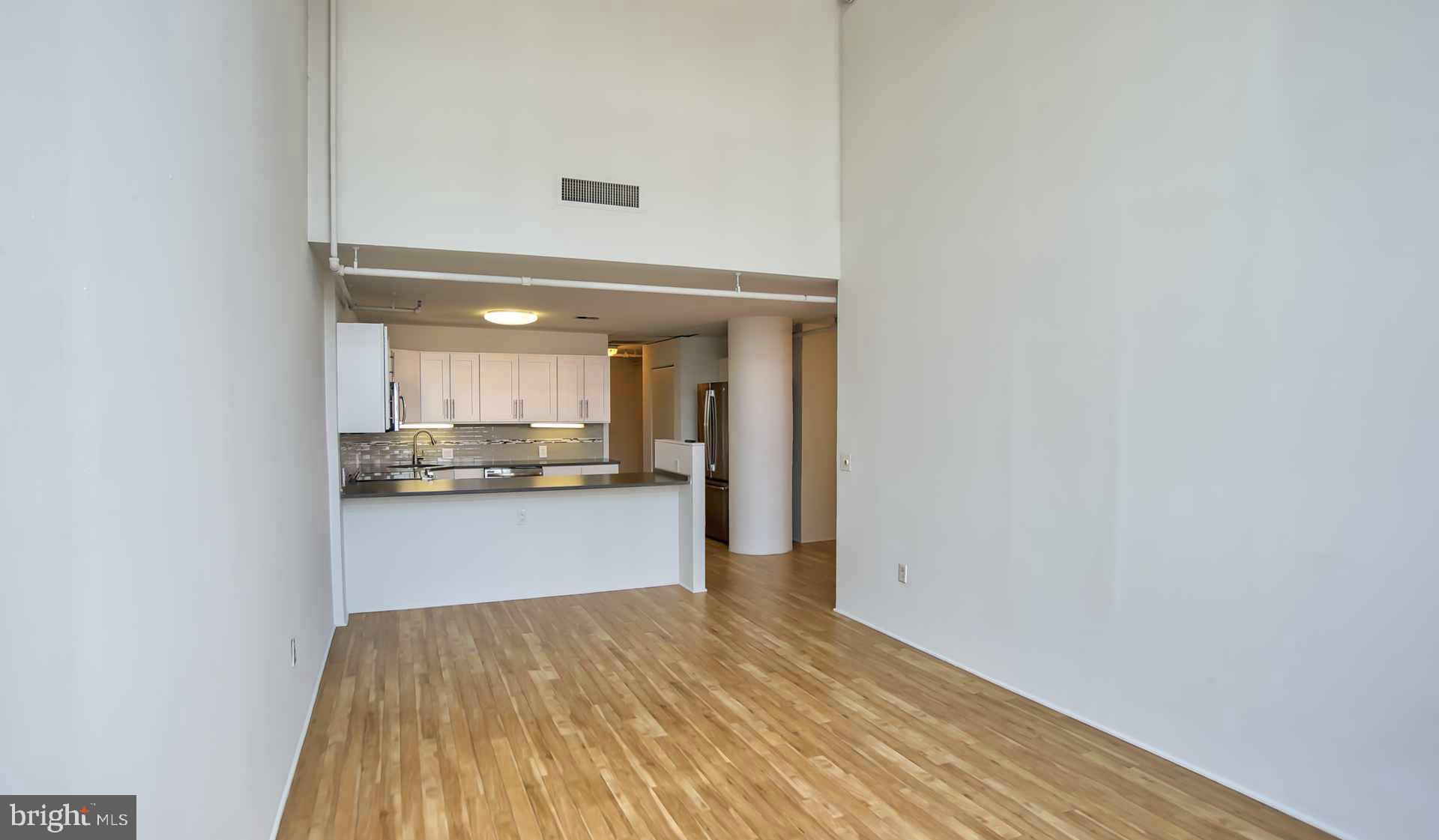 2300 Walnut Street, Unit 1B232 Philadelphia, PA 19103 - Photo 26 of 30 a view of a kitchen from the hallway