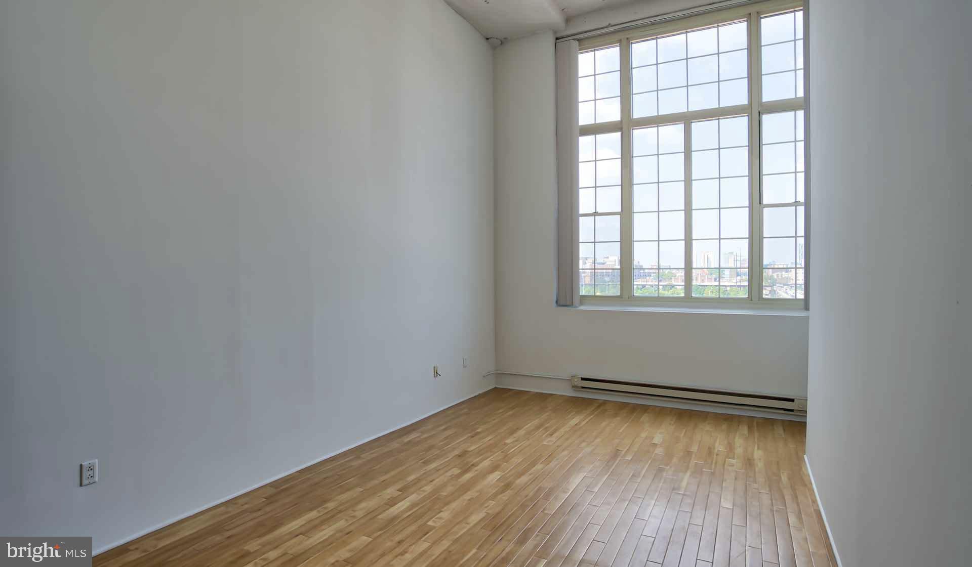 2300 Walnut Street, Unit 1B232 Philadelphia, PA 19103 - Photo 5 of 30 an empty room with a window