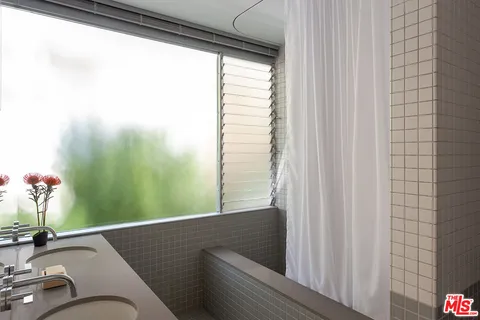a view of a balcony with chair