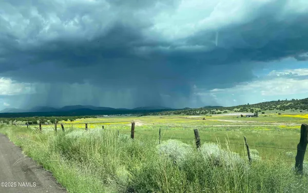 a view of a lake with a mountain in the background