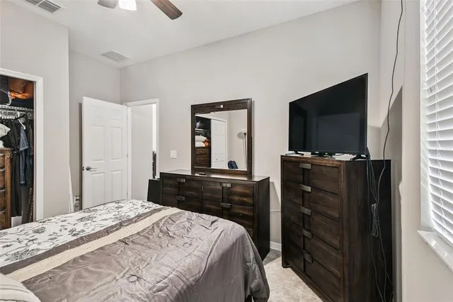 a view of a porch with furniture and garden