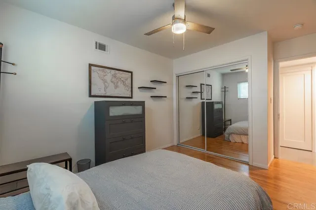 a bedroom with a bed and a view of bedroom