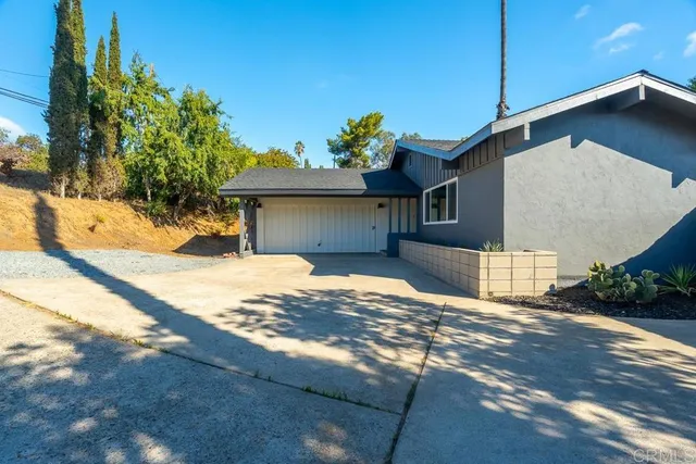 a view of a house with a patio