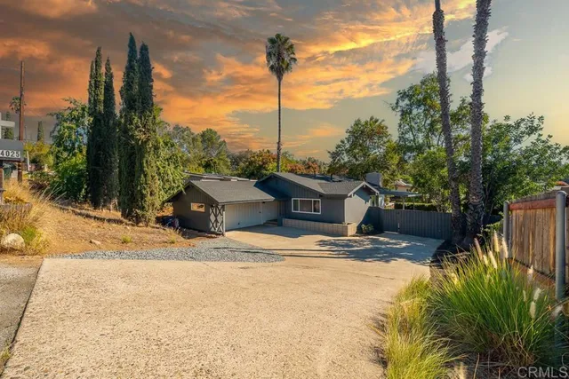 an aerial view of multiple house with yard