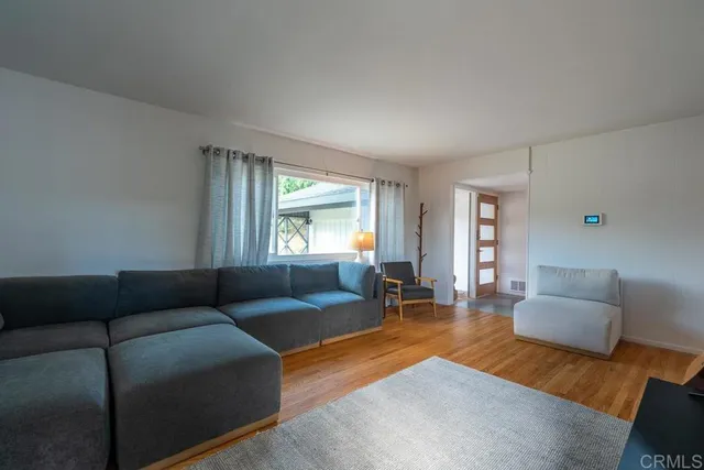 a living room with furniture and a couch