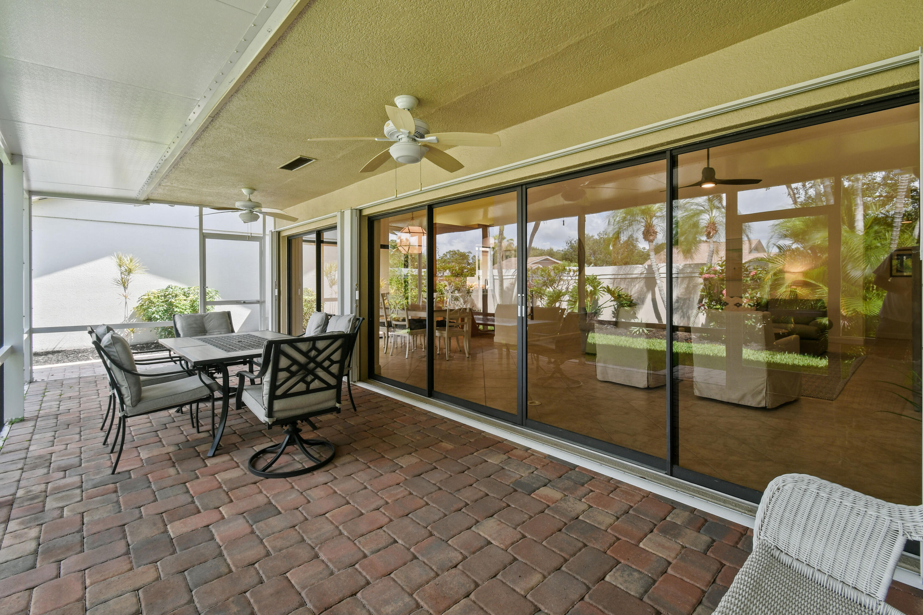 308 Ridge Road Jupiter, FL 33477 - Photo 31 of 42 Screened-in patio