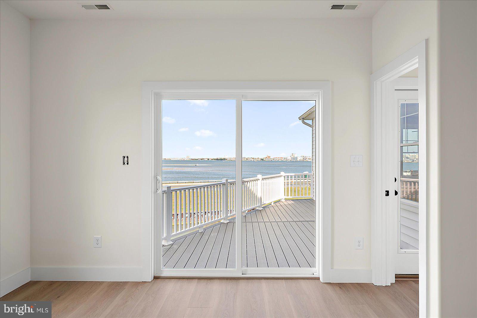 12971 Inlet Isle Lane Ocean City, MD 21842 - Photo 51 of 134 Primary Bedroom with direct deck access
