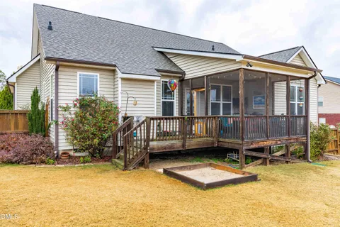 a sitting area with wooden floor view