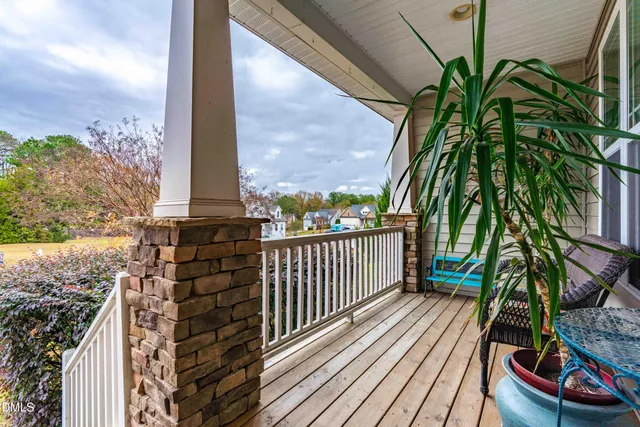 an aerial view of a house with a swimming pool