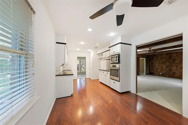 a view of a electric room an empty space and a window