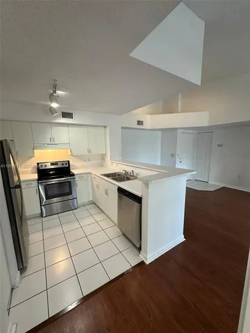 a view of a lake with houses