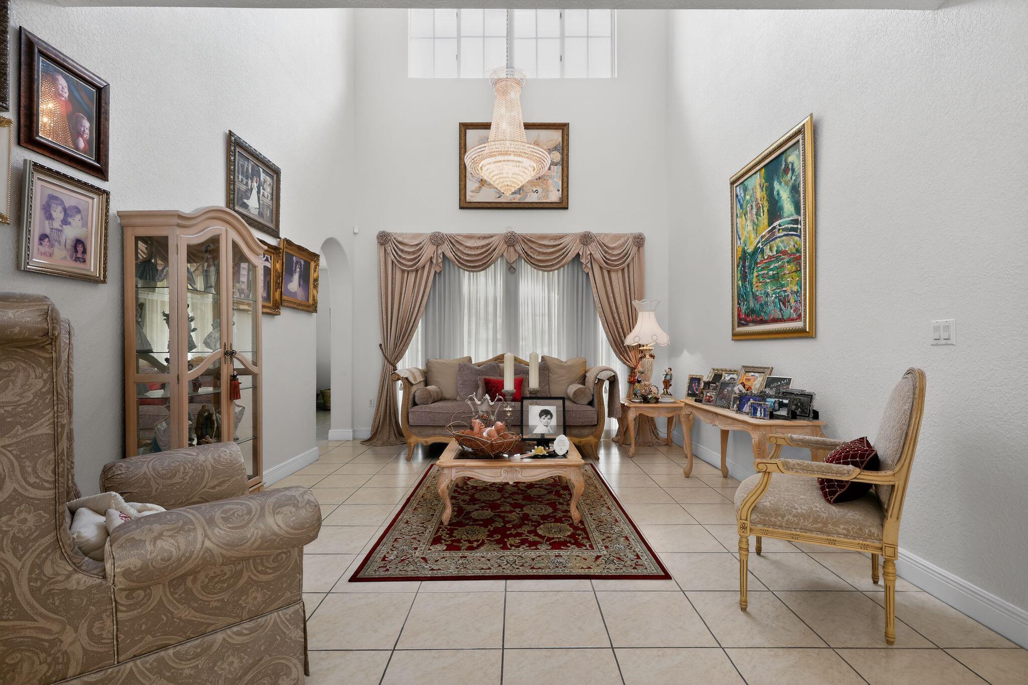 16613 Northwest 77th Path Miami Lakes, FL 33016 - Photo 14 of 41 a living room with furniture and a rug