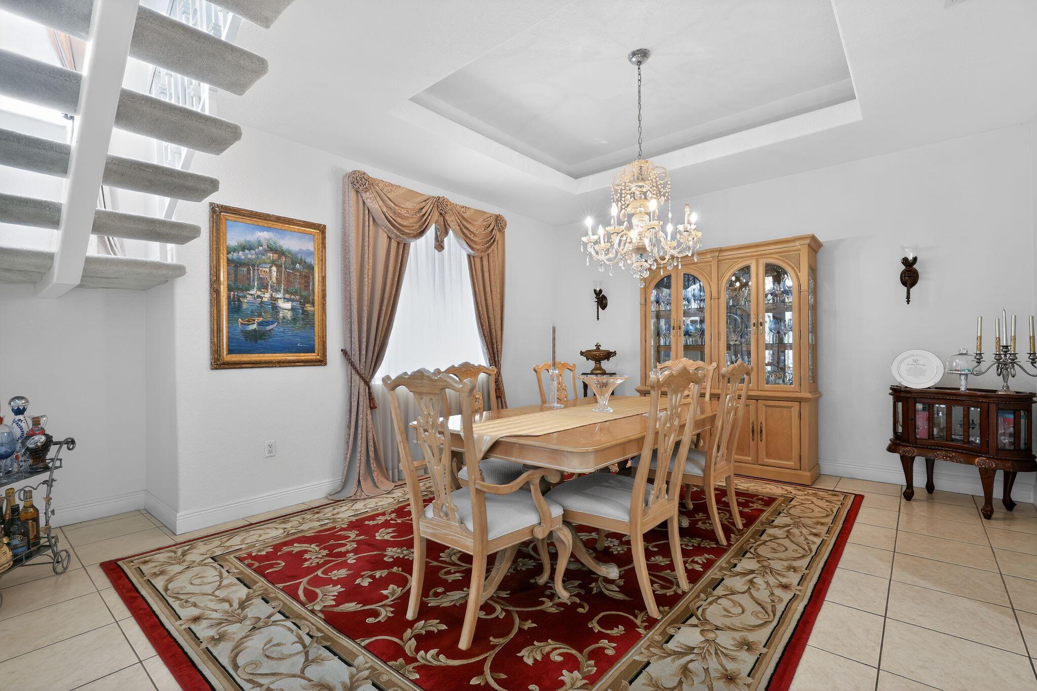 16613 Northwest 77th Path Miami Lakes, FL 33016 - Photo 19 of 41 a view of a dining room with furniture
