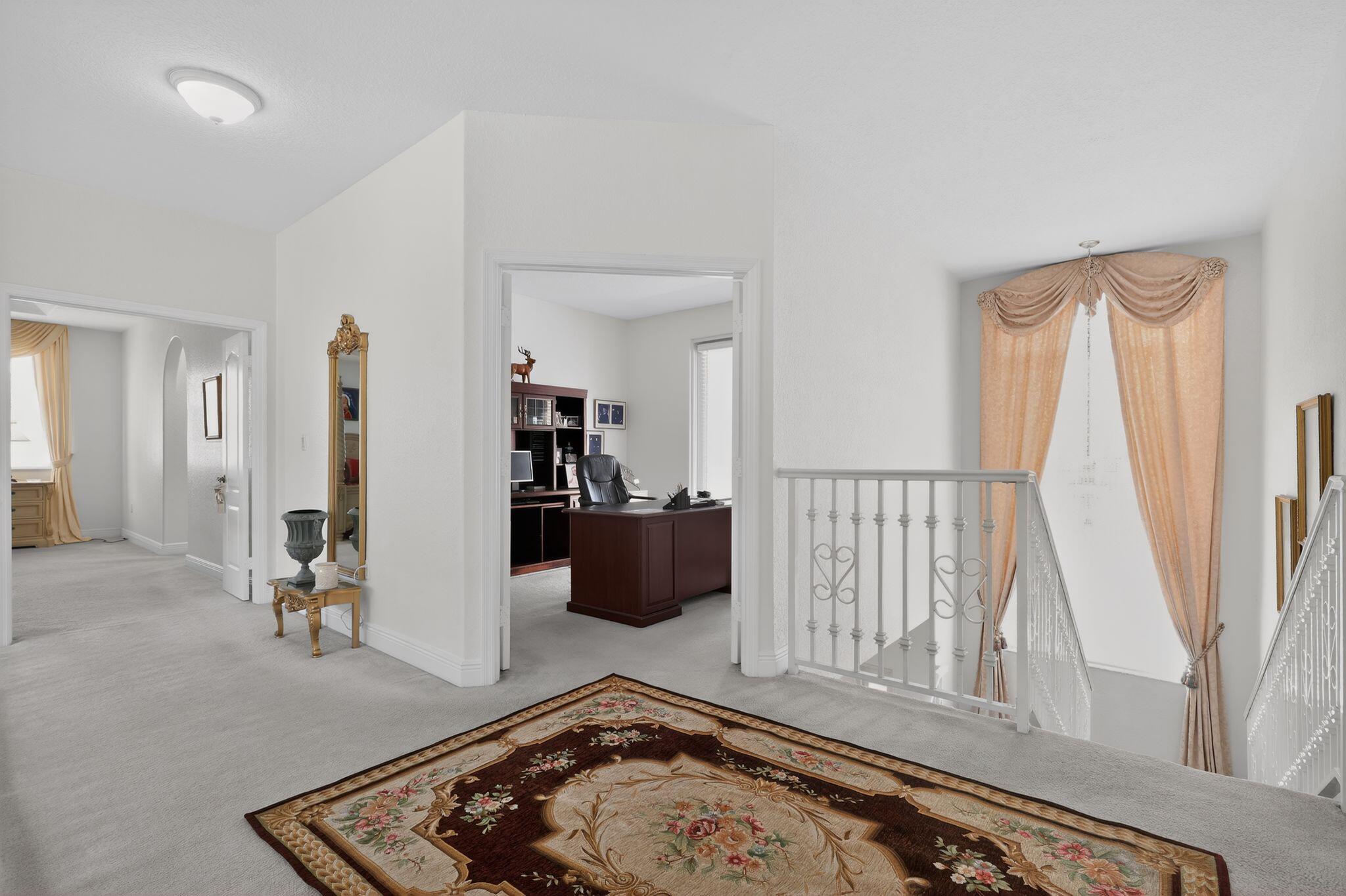 16613 Northwest 77th Path Miami Lakes, FL 33016 - Photo 40 of 41 a living room with furniture and a rug