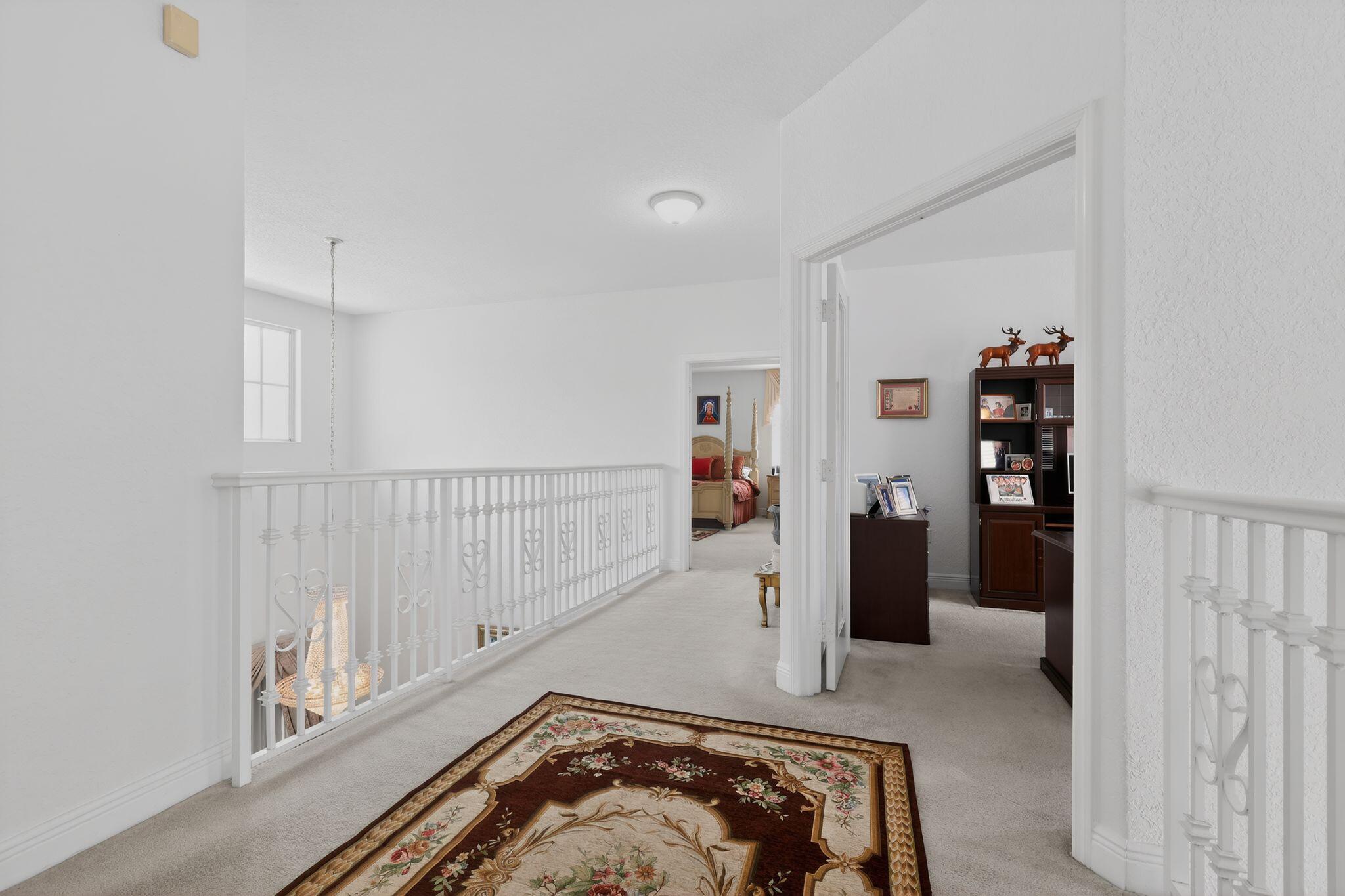 16613 Northwest 77th Path Miami Lakes, FL 33016 - Photo 41 of 41 a bedroom with furniture and white walls