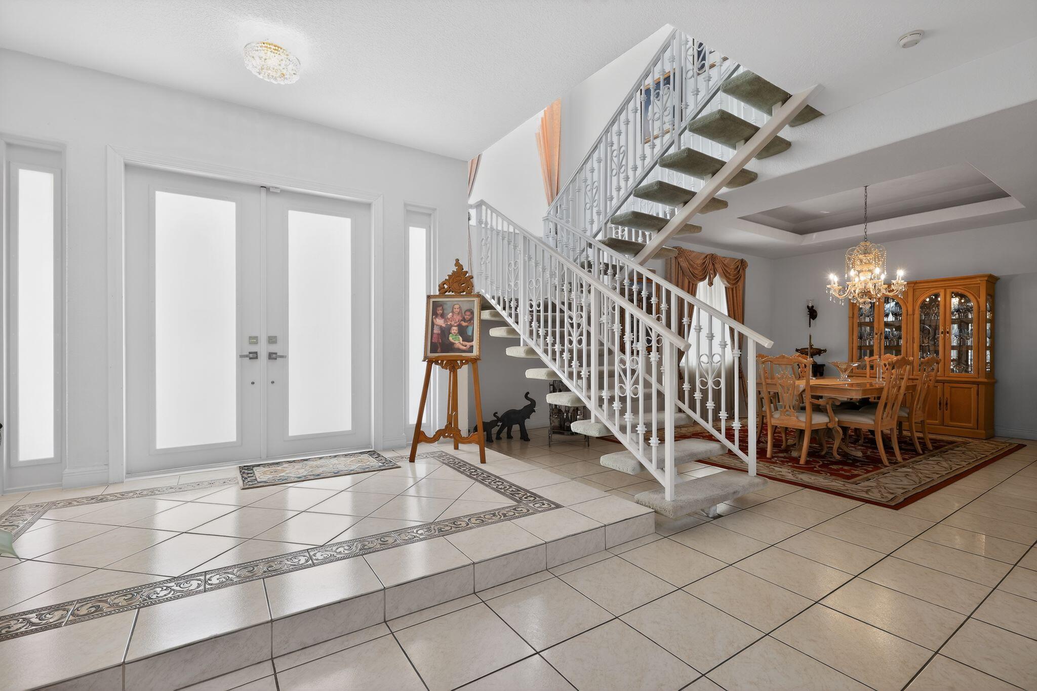 16613 Northwest 77th Path Miami Lakes, FL 33016 - Photo 8 of 41 a view of entryway with wooden floor
