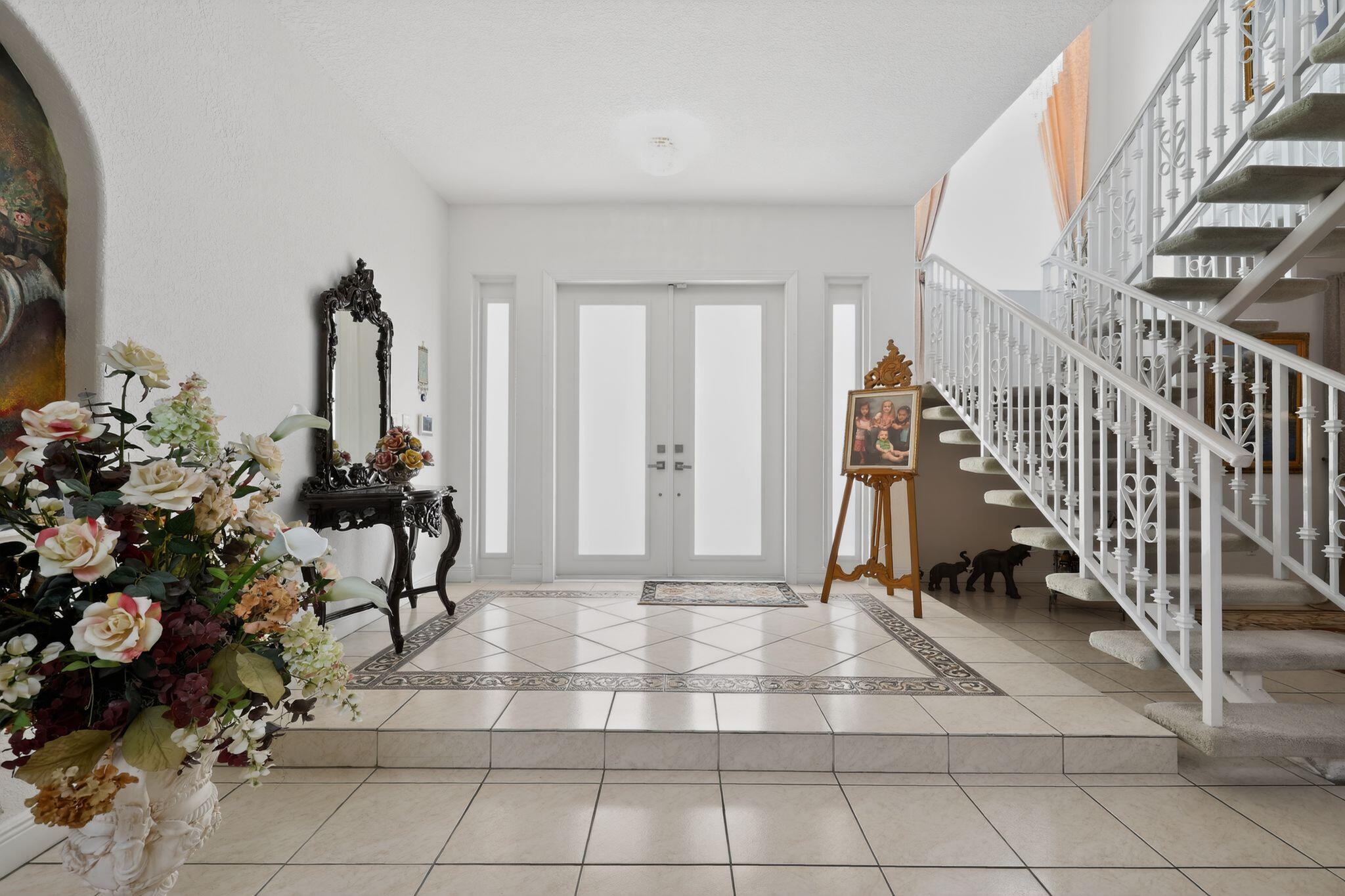 16613 Northwest 77th Path Miami Lakes, FL 33016 - Photo 9 of 41 a view of an entryway with wooden floor