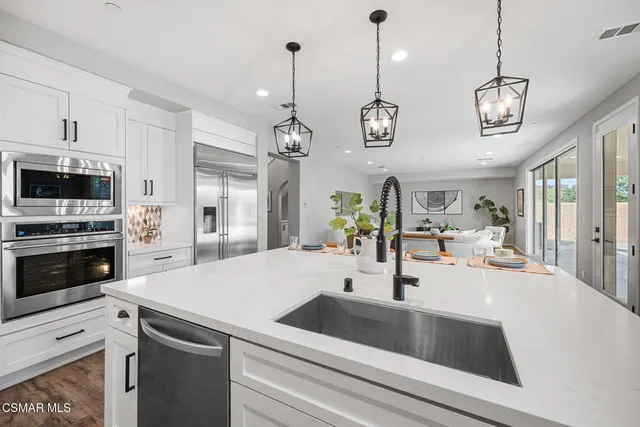 a large kitchen with lots of counter space and appliances