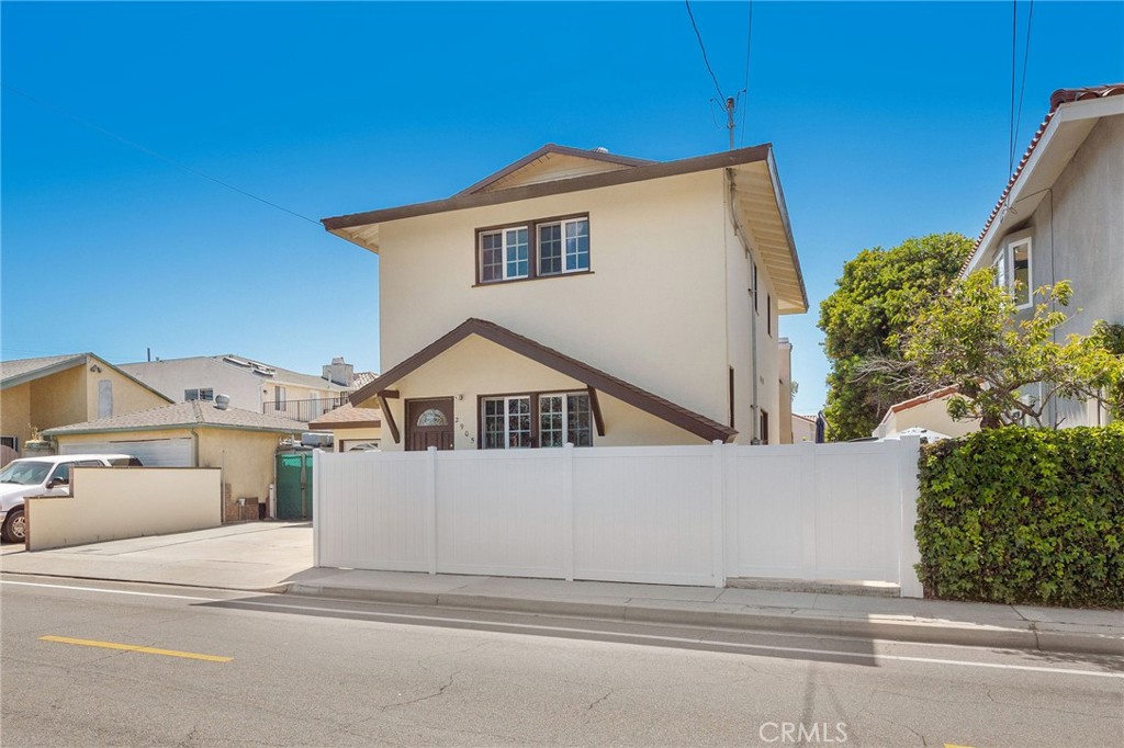 2905 Rindge Lane Redondo Beach, CA 90278 - Photo 26 of 26 a view of a house with a yard and garage