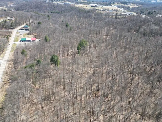 a brick oven with a yard in the back