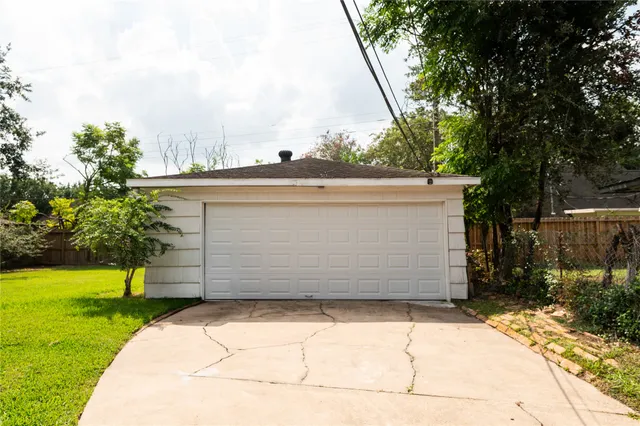 a view of outdoor space garage and basketball court
