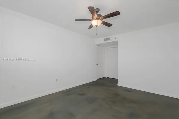 a view of a small space with a fan