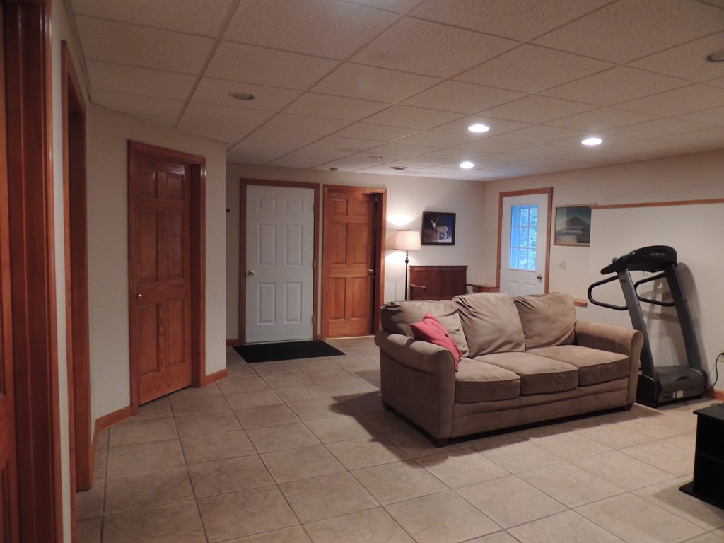 52 Ayers Road Monson, MA 01057 - Photo 15 of 25 a bedroom with a bed and a walk in closet