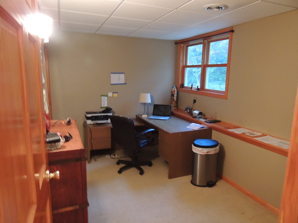 52 Ayers Road Monson, MA 01057 - Photo 22 of 25 a room with a chair and gym equipment