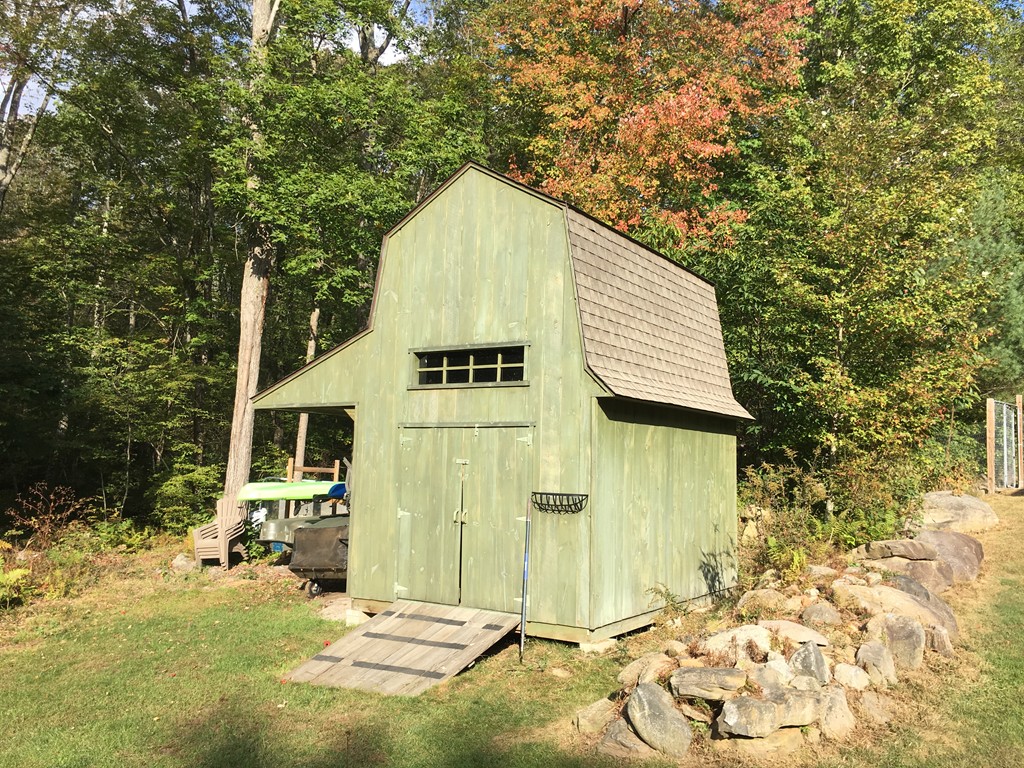 52 Ayers Road Monson, MA 01057 - Photo 23 of 25 a view of a house with a yard