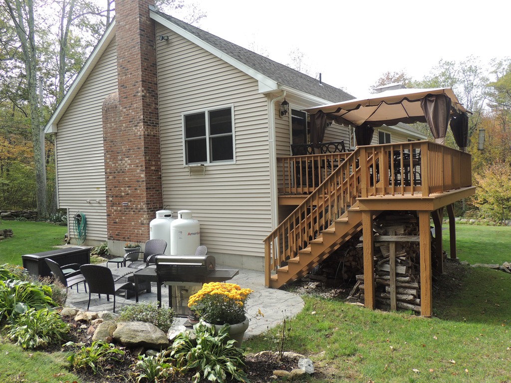 52 Ayers Road Monson, MA 01057 - Photo 3 of 25 a view of a house with backyard and sitting area