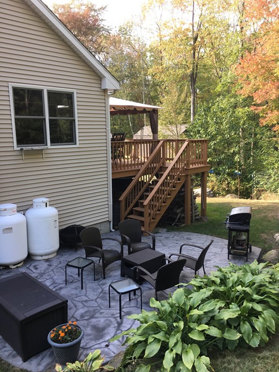 52 Ayers Road Monson, MA 01057 - Photo 5 of 25 a roof deck with table and chairs