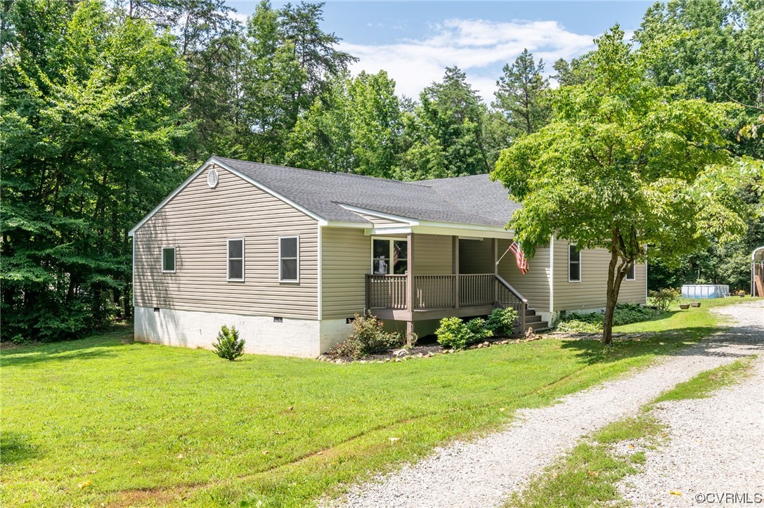 3928 Whitehall Road Sandy Hook, VA 23153 - Photo 1 of 33 a view of a house with yard and plants