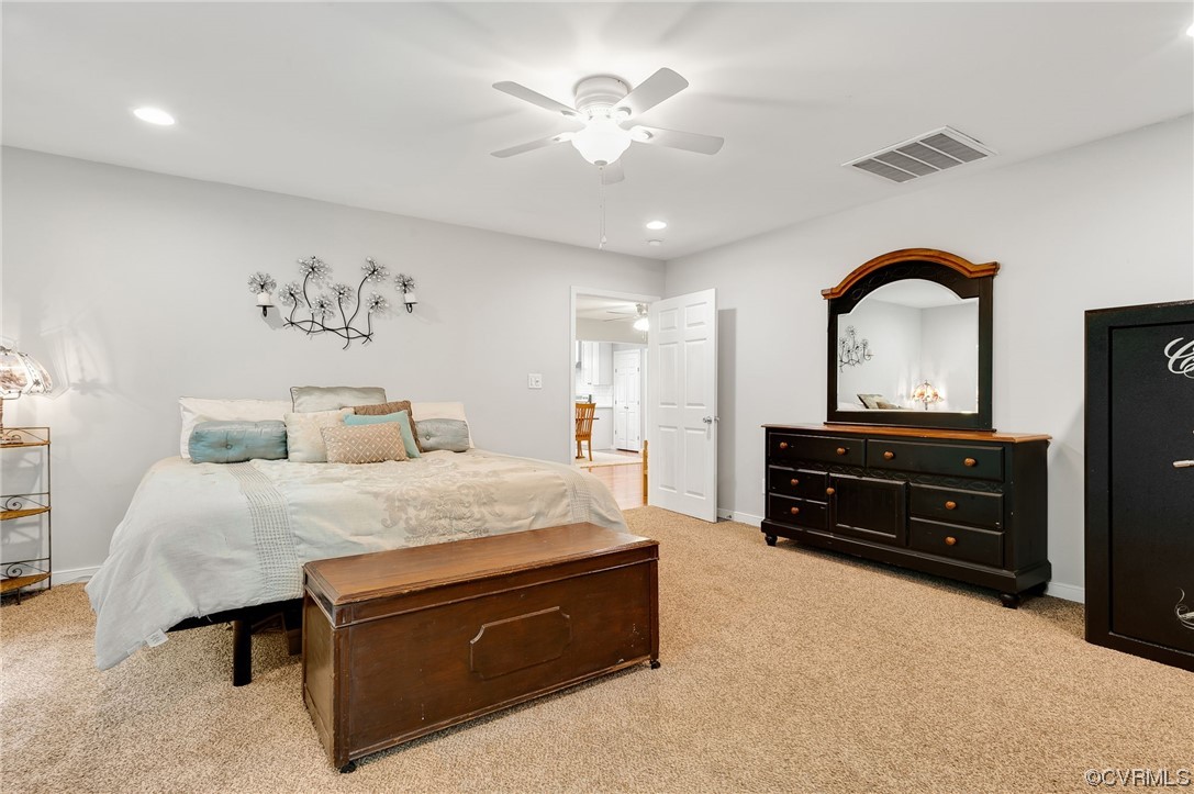 3928 Whitehall Road Sandy Hook, VA 23153 - Photo 17 of 33 a bedroom with a bed and a dresser