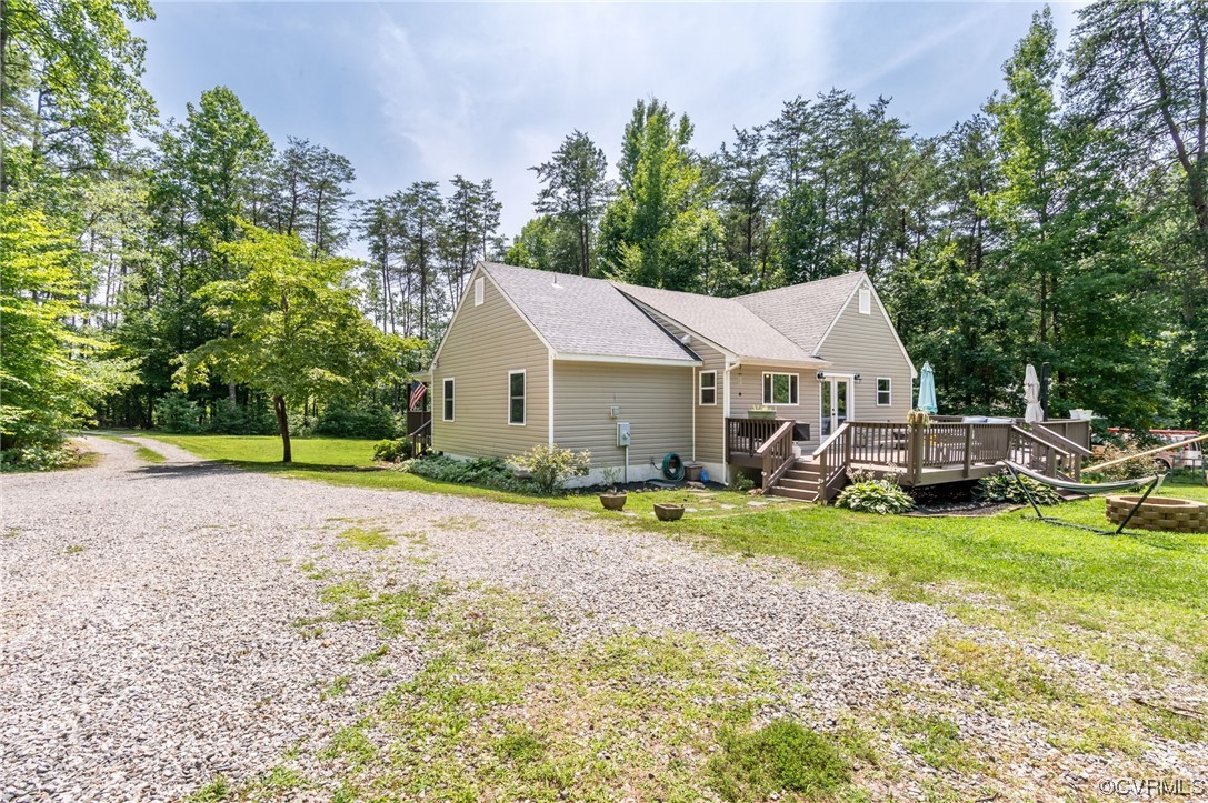 3928 Whitehall Road Sandy Hook, VA 23153 - Photo 31 of 33 a aerial view of a house with swimming pool and yard