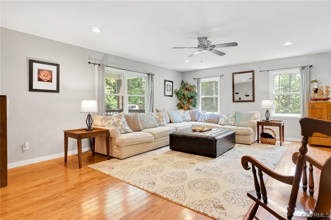 3928 Whitehall Road Sandy Hook, VA 23153 - Photo 6 of 33 a living room with furniture and a large window
