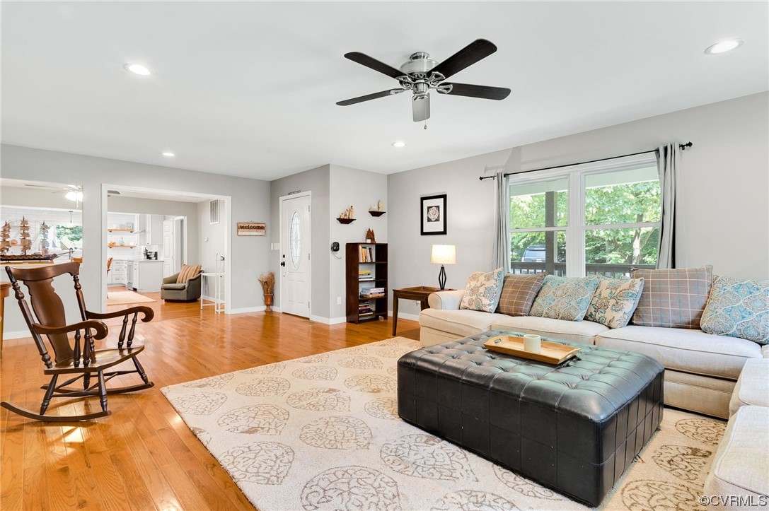 3928 Whitehall Road Sandy Hook, VA 23153 - Photo 7 of 33 a living room with furniture and a large window