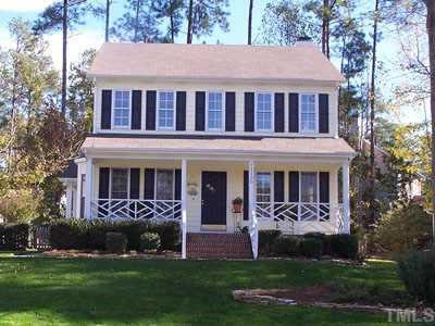 12100 North Exeter Way Raleigh, NC 27613 - Photo 1 of 1 a view of a house with a yard plants and large tree