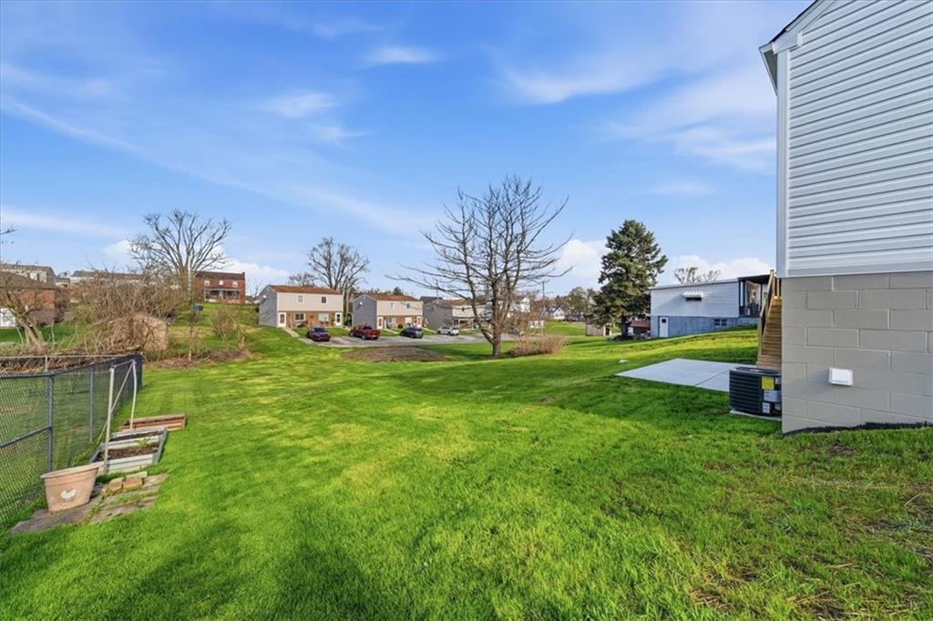 1216 Eckert Road Monaca, PA 15061 - Photo 6 of 30 a view of a garden with lawn chairs