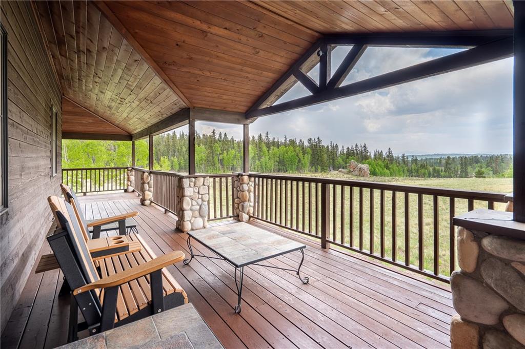177 East Longbow Drive Como, CO 80456 - Photo 20 of 27 a view of a chairs on wooden deck