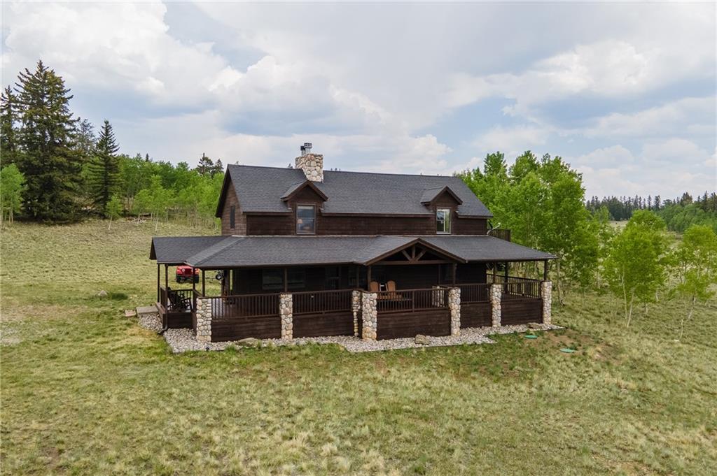 177 East Longbow Drive Como, CO 80456 - Photo 22 of 27 a front view of a house with a garden