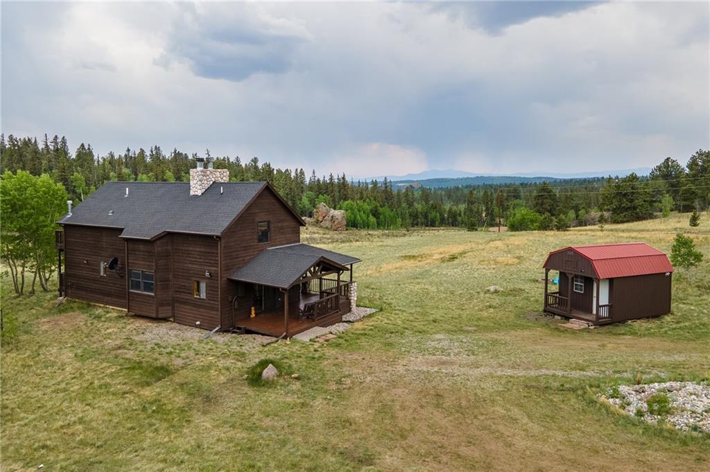 177 East Longbow Drive Como, CO 80456 - Photo 25 of 27 a view of a house with yard and sitting area