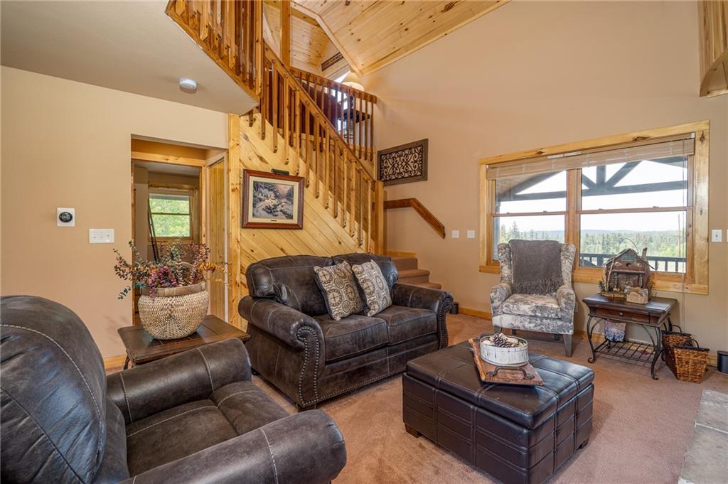 177 East Longbow Drive Como, CO 80456 - Photo 6 of 27 a living room with furniture and a large window