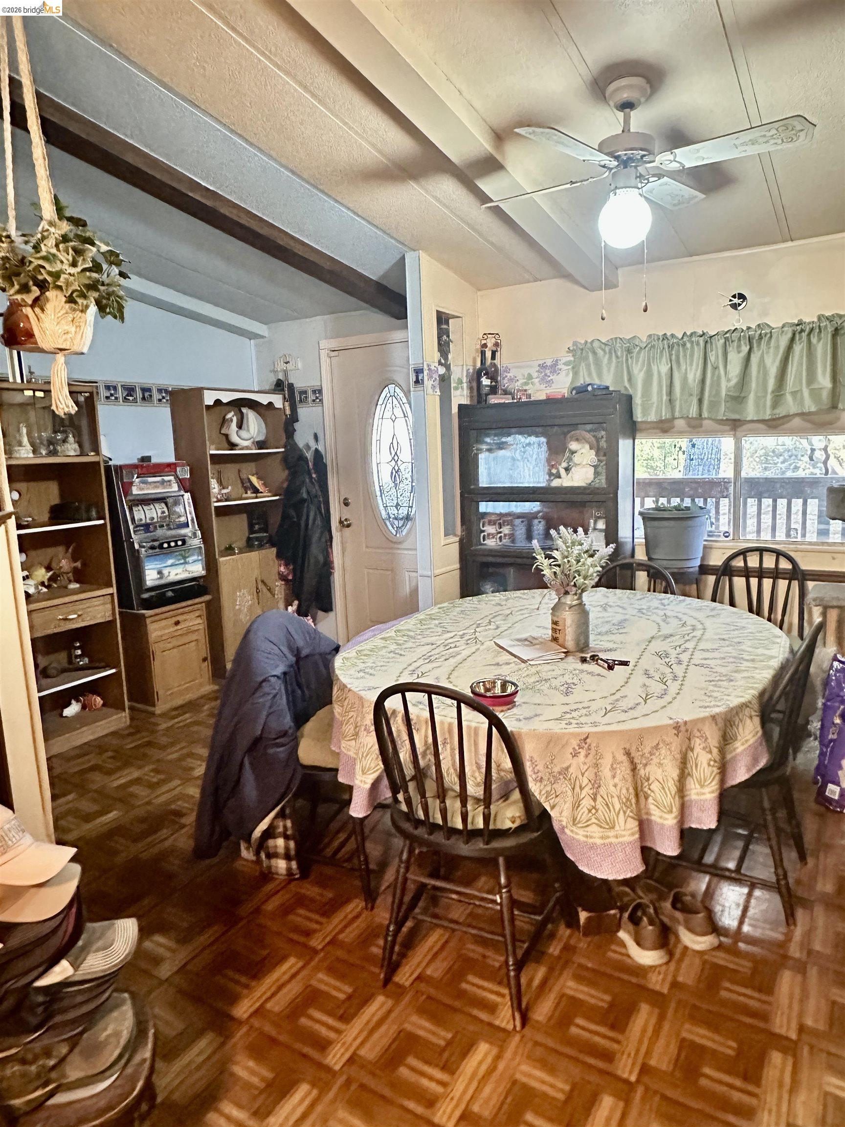 11761 Essen Lane Sonora, CA 95370 - Photo 12 of 20 a view of a dining room with furniture and wooden floor