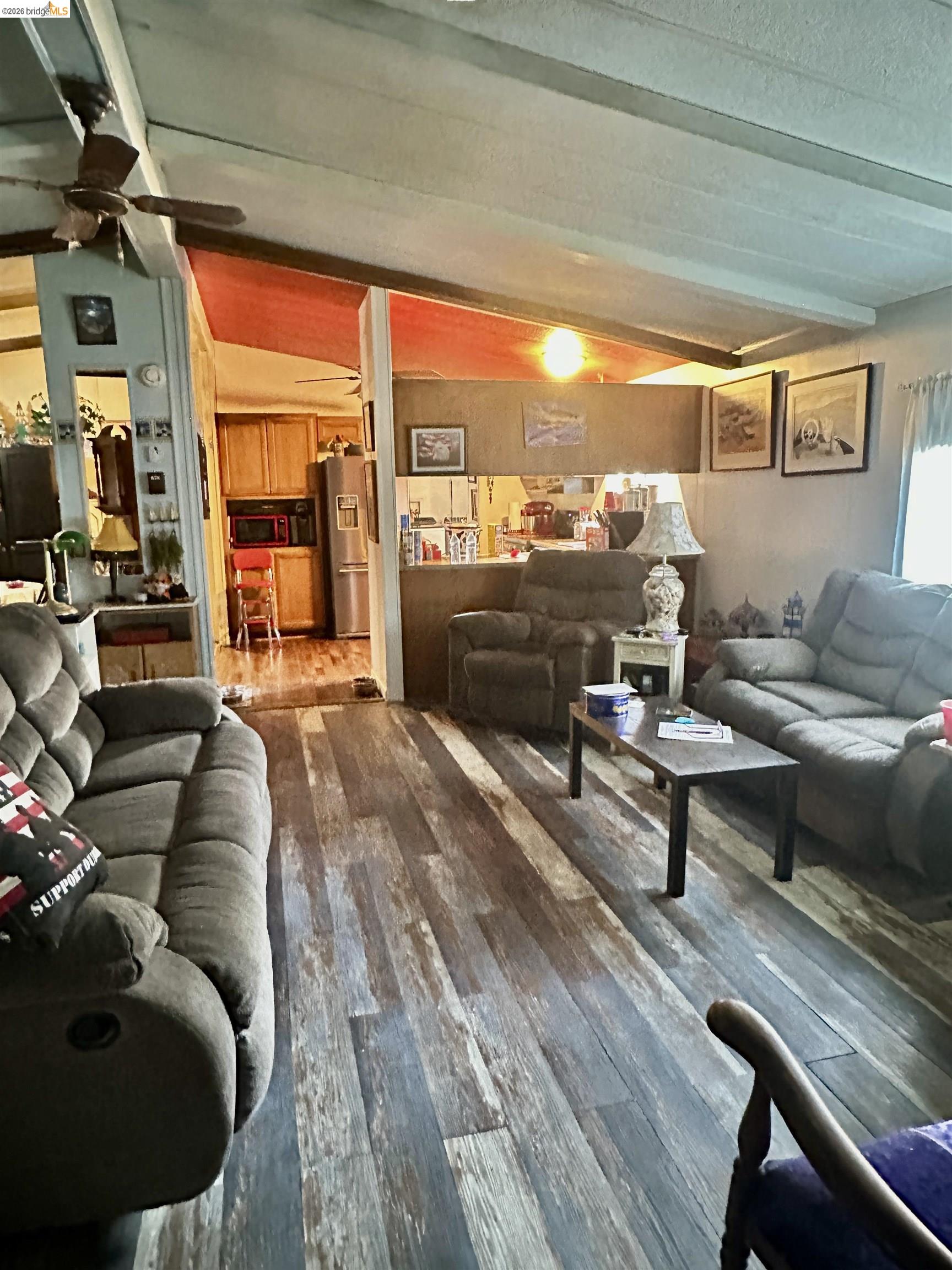 11761 Essen Lane Sonora, CA 95370 - Photo 15 of 20 a living room with furniture and a floor to ceiling window