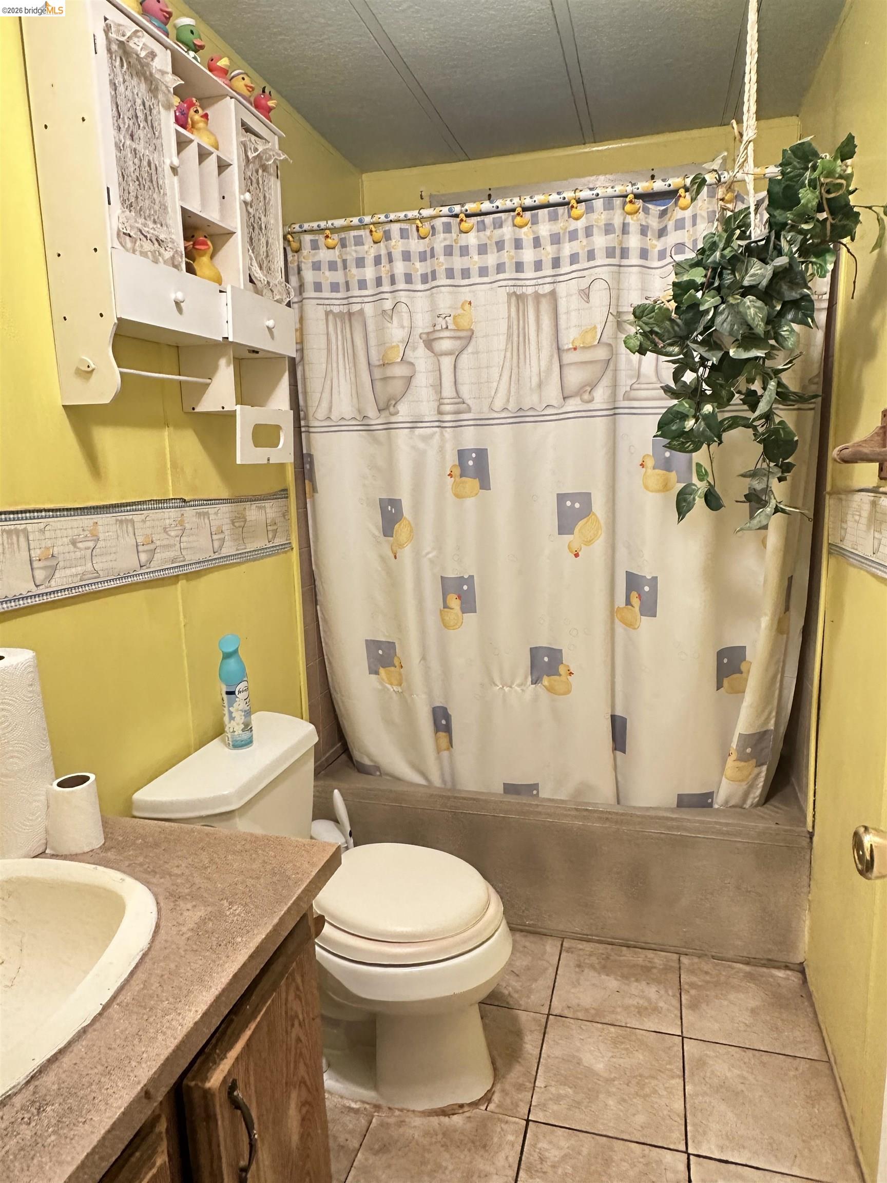 11761 Essen Lane Sonora, CA 95370 - Photo 18 of 20 a bathroom with a sink toilet and shower