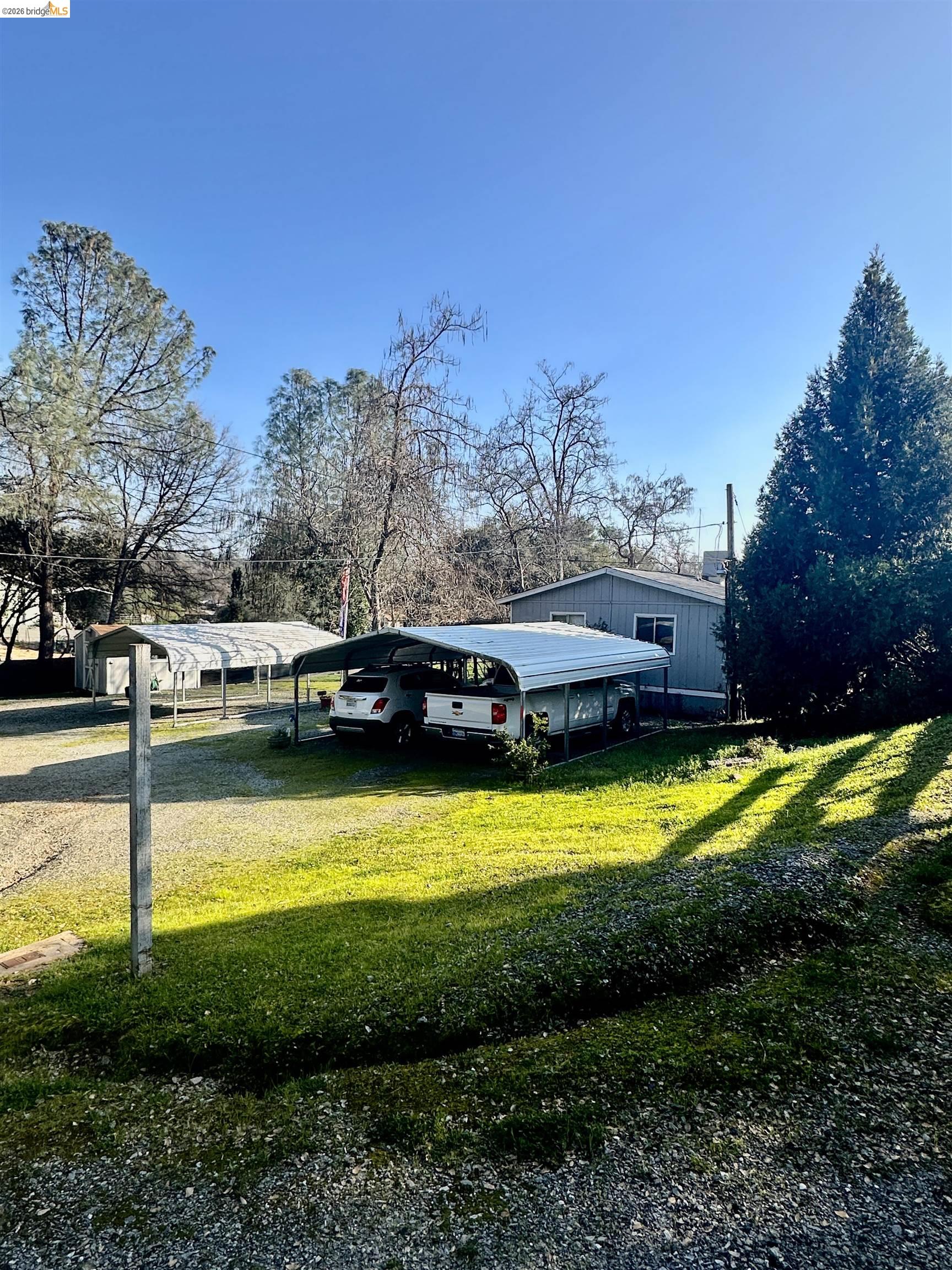 11761 Essen Lane Sonora, CA 95370 - Photo 2 of 20 a swimming pool view with a outdoor seating