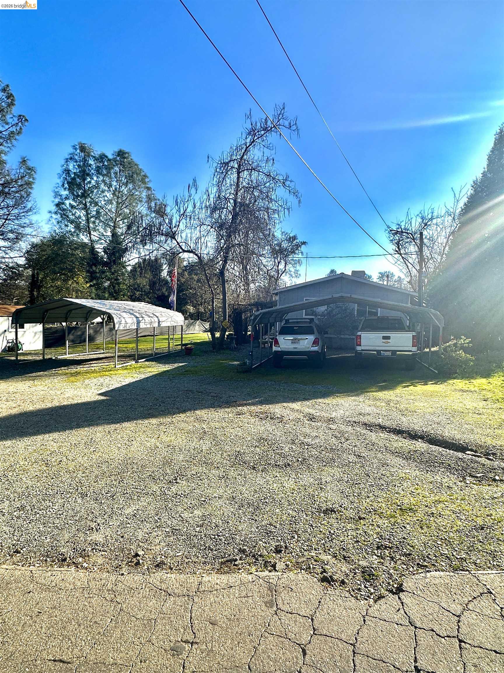 11761 Essen Lane Sonora, CA 95370 - Photo 3 of 20 a view of a swimming pool with an outdoor space and seating area